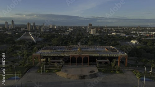 Drone slowly flies to the front of Palacio Araguaia Governador Jose Wilson Siqueira Campos at sunrise photo