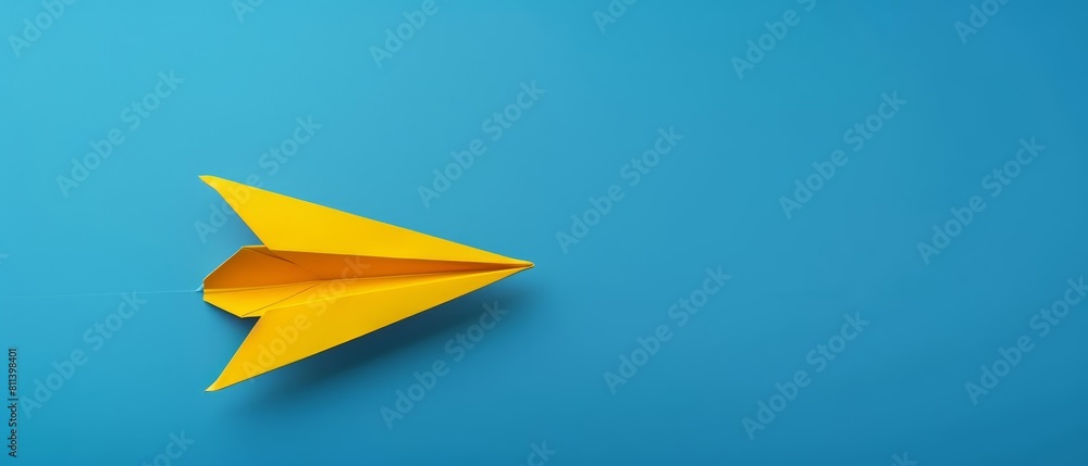 An artistic representation of a yellow paper plane against a calming blue backdrop, embodying the idea of achieving success in business growth An artistic representation of a yellow paper plane against a calming blue backdrop, embodying the idea of achieving success in business growth