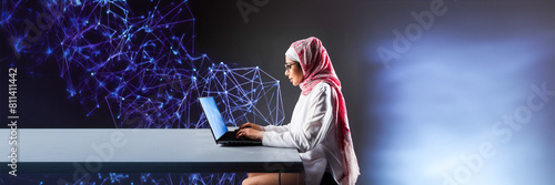 Afghan woman worker wearing scarf working on computer minimal design photo