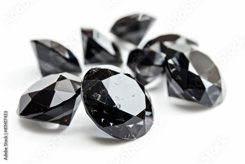 A striking display of black diamond jewels  each cut to perfection and isolated against a pure white background  emphasizing their unique luster