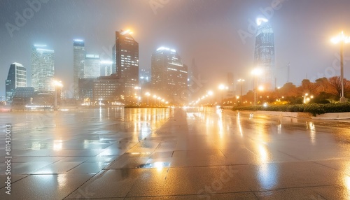 The stunning cityscape unfolds under the darkness of dusk on a rainy day.