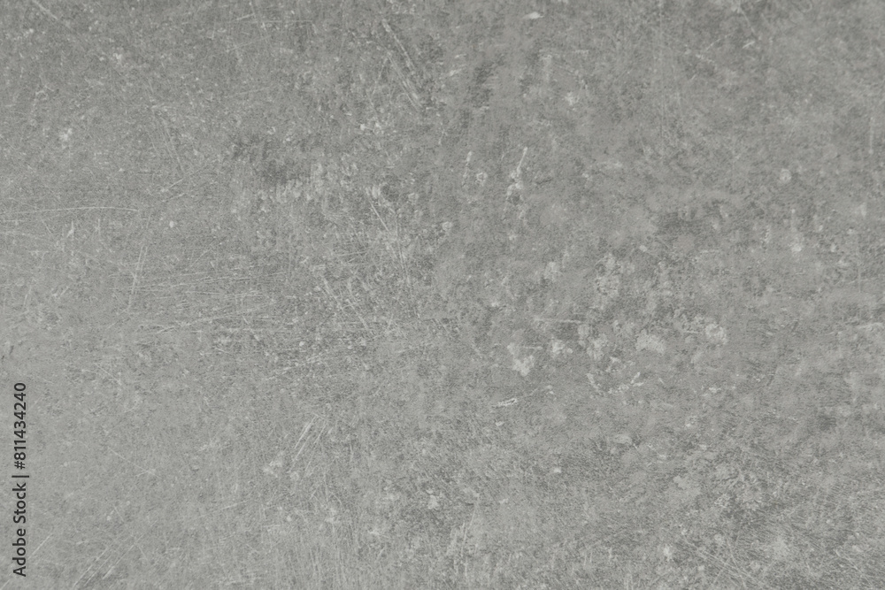 Grey concrete textured surface as background, closeup