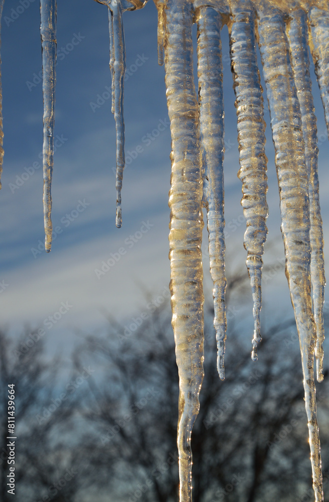 Icicles on blurred background. Icicles on blurred background.