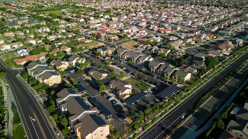 aerial view of a middle class brand new residential houses neighborhood in a city suburbs. suburbia