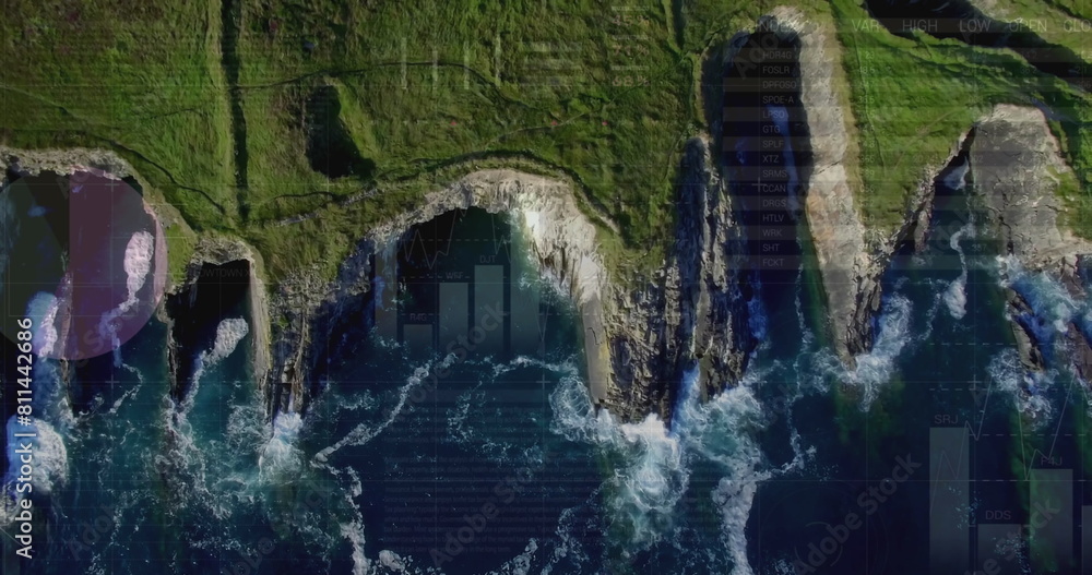 Obraz premium Image of financial graphs and data over sea and land top view