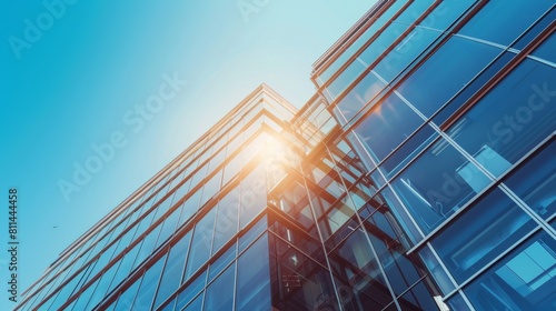 Impressive new multi-story building with bright sunlight against the backdrop of a clear sky  perfect architectural showcase