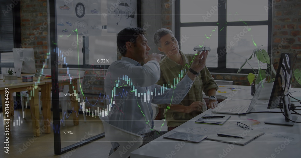 Obraz premium Image of financial data processing over diverse business people in office
