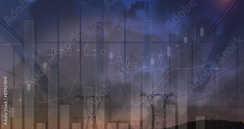 Image of financial graphs over electricity poles at dusk