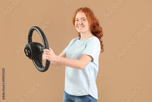Pretty young woman with ste...