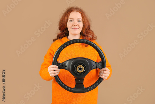 Pretty young woman with ste...