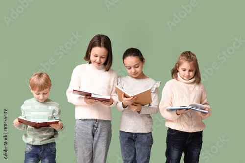 Four diverse children readi...