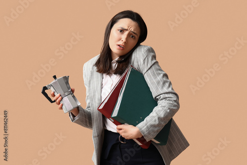 Stressed businesswoman with...