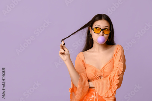 Stylish young asian woman b...