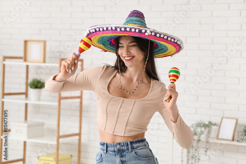Young woman in sombrero wit...
