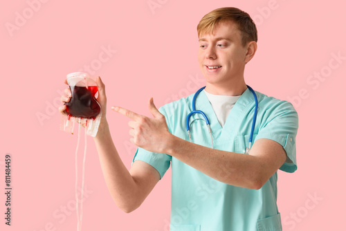 Male nurse pointing at bloo...