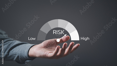 CEO manager management. Businessman showing risk level indicator rating since low to high for risk management and assessment review concept. Business and finance concept.