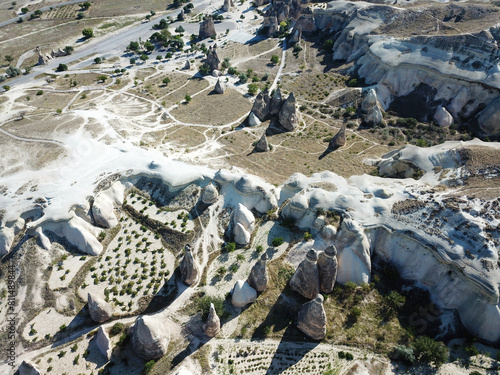 Aerial drone shot of the Fairy Chimneys over the landscape of Goreme, Cappadocia.