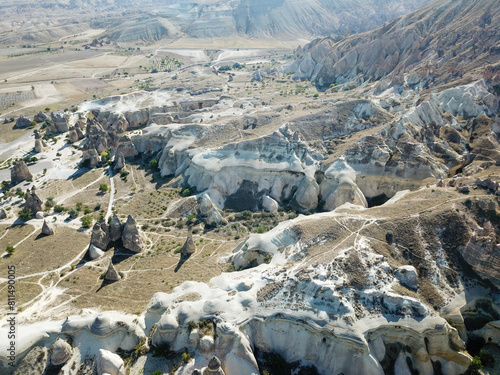 Aerial drone shot of the Fairy Chimneys over the landscape of Goreme, Cappadocia.