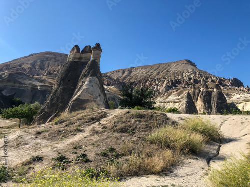 Aerial drone shot of the Fairy Chimneys over the landscape of Goreme, Cappadocia.