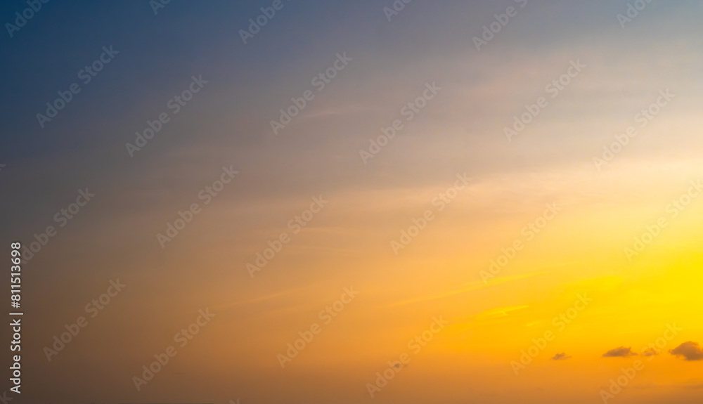 Fototapeta premium Enjoy a panoramic view of the skyline. The sun rises in the morning sky with colorful clouds. and beautiful cloud patterns In the soft light of the morning 