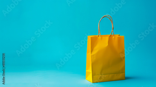 A yellow paper shopping bag on a blue background.