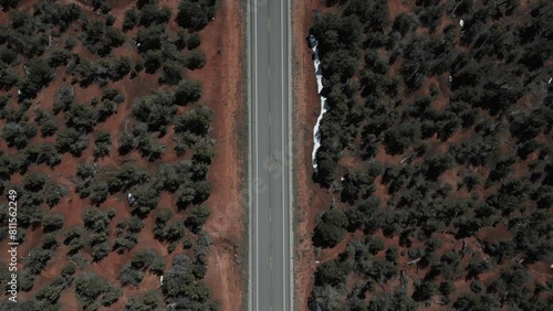 Aerial view of black car driving on interstate highway in Utah, USA. photo