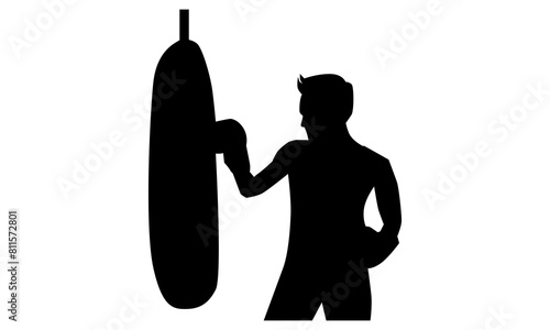 silhouette of Man punching sand sack