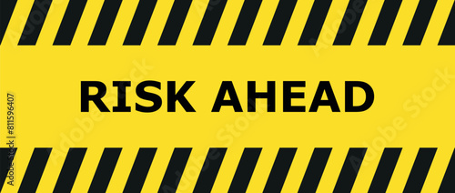 yellow road sign as a warning of risk ahead