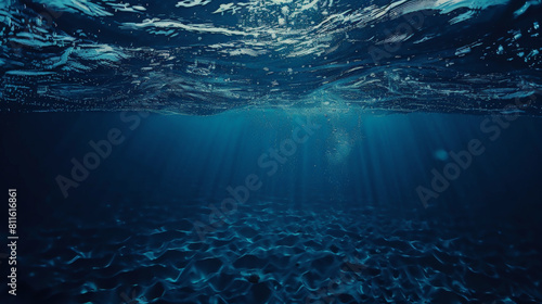 Dark blue ocean surface seen from underwater. The relief of the seabed through the water column. Generative AI