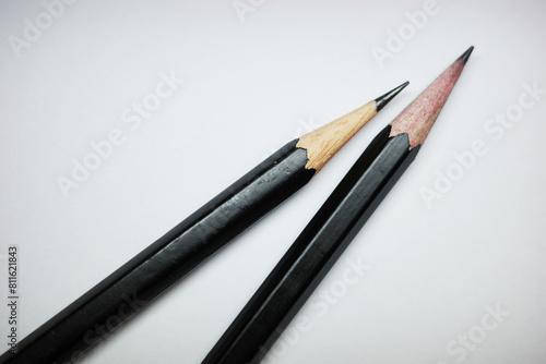 Black pencil wood on white background