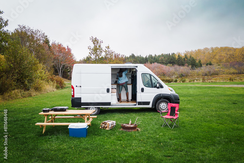 Cozy campervan life amidst Nova Scotia's fall colors photo
