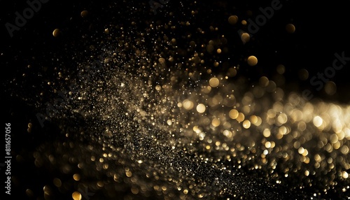 Sparkly gold glitter texture on a black background for a glamorous and elegant touch.