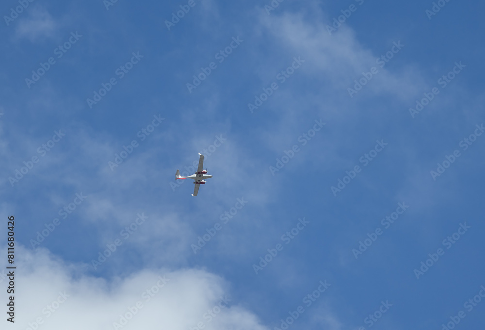 twin-engine plane against the background of clouds twin-engine plane against the background of clouds