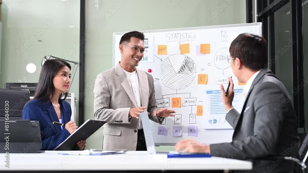 Young business creative team are brainstorming planning discussing while sitting in creative business discussing wor Young business creative team are brainstorming planning discussing while sitting in creative business discussing wor
