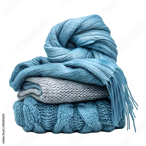 cyan sweater and scarf pile isolated on white background