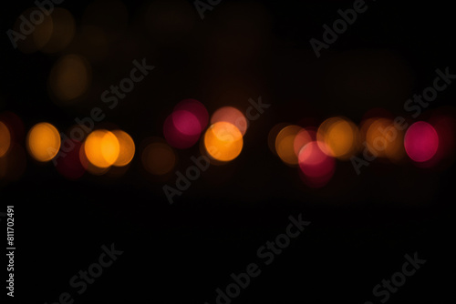 Bokeh lights at night in urban setting © Edvvin