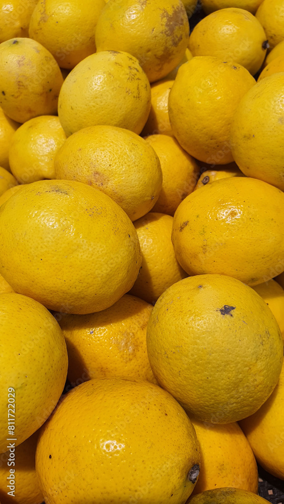 Close up pile of tasty fresh limes sold at the market as a background. Close up pile of tasty fresh limes sold at the market as a background.