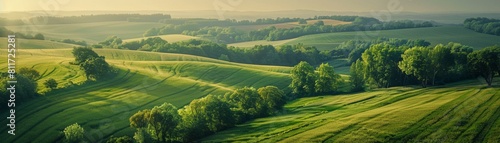 A beautiful landscape with green hills and a blue sky. 