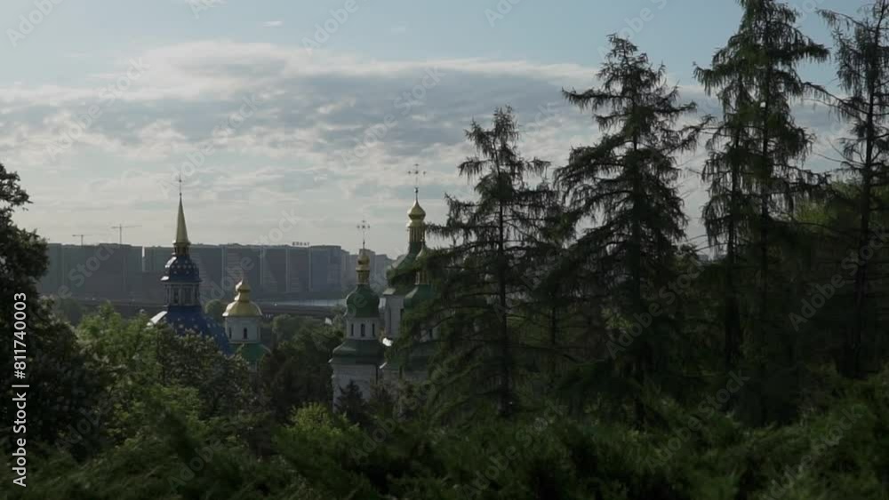Summertime in the city. Kyiv, urban view with Vydubichi Orthodox Church, monastery Summertime in the city. Kyiv, urban view with Vydubichi Orthodox Church, monastery