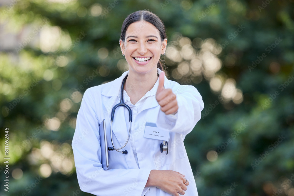Doctor, nature portrait and woman with thumbs up for health goal, trust and positive test result. Female medical worker, hand and yes emoji for surgery success, agreement and thank you in Australia Doctor, nature portrait and woman with thumbs up for health goal, trust and positive test result. Female medical worker, hand and yes emoji for surgery success, agreement and thank you in Australia