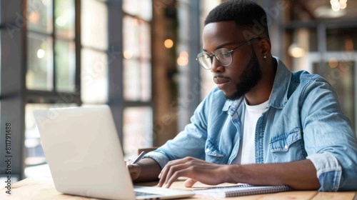 Man Concentrating on Laptop Work