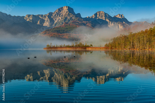Obraz na płótnie Misty Morning at Almsee, Mountain Reflection and Serene Lake w salonie