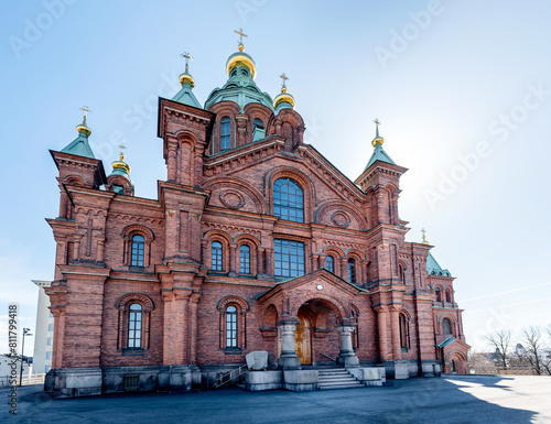 Uspenski Cathedral, Orthodox church in Helsinki, on a hill at sunny day. Red Church - Tourist destination In Finnish Capital, Finland. photo