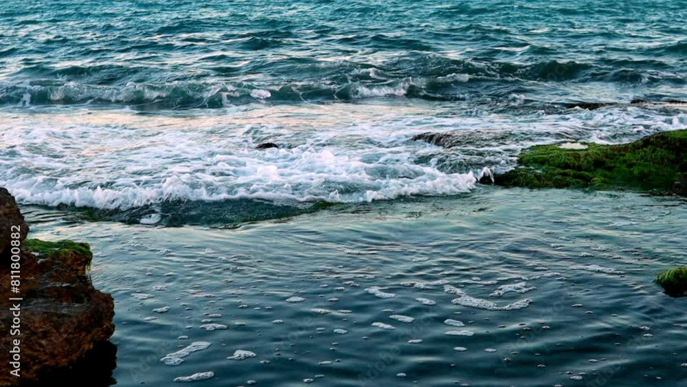 sea wave with rocks and foam. background sea wave with rocks and foam. background