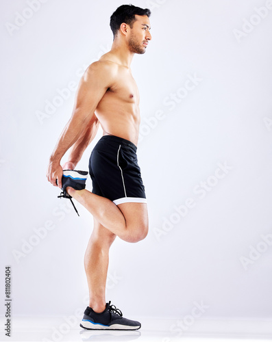Man, stretch or prepare for fitness goals, workout or training motivation and wellness check. Bodybuilder, sports athlete or model body with warm up, muscle and legs on white studio background