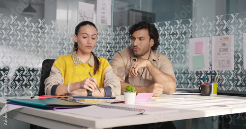 Vászonkép Indian Hindu Asian gen z adult busy woman lady staff sitting chair man trying to