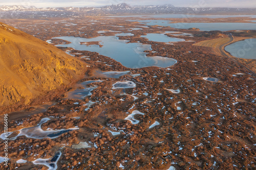 Mystical space drone view mountain and frozen lake pseudocraters. Myvatn in the north of Iceland. photo