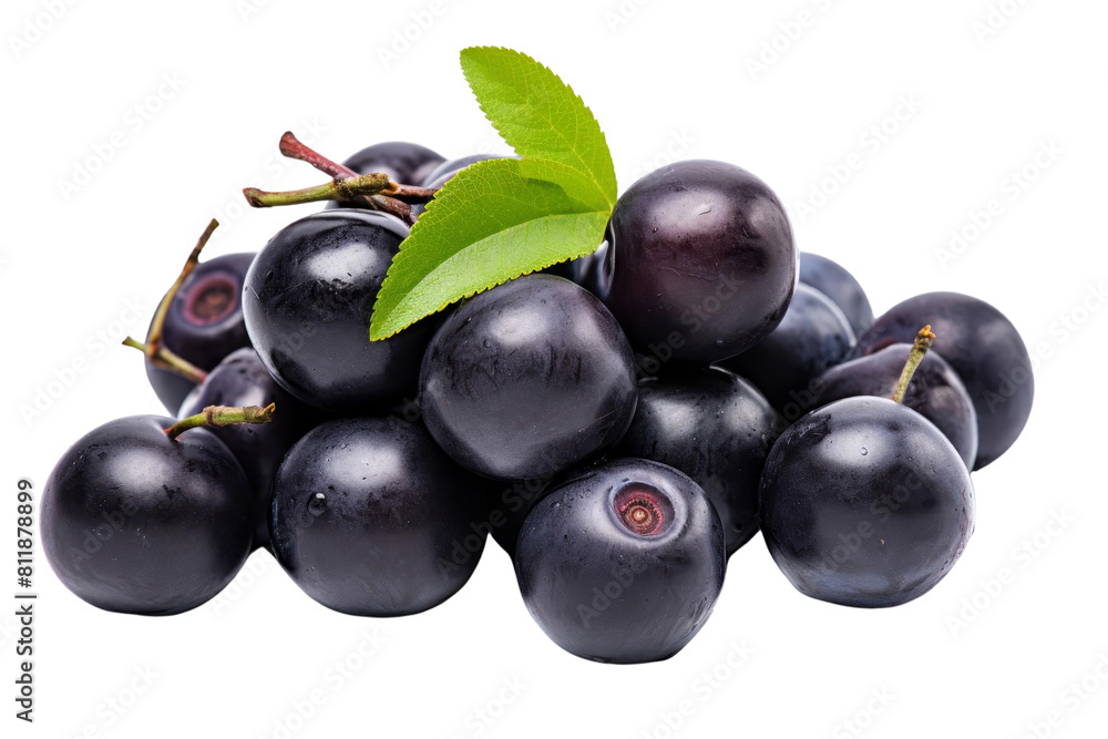 A bunch of black berries with a leaf on top. The berries are small and round A bunch of black berries with a leaf on top. The berries are small and round