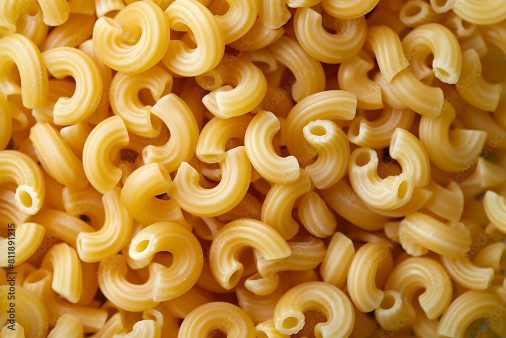 Uncooked Macaroni Pasta in Close-Up View Uncooked Macaroni Pasta in Close-Up View
