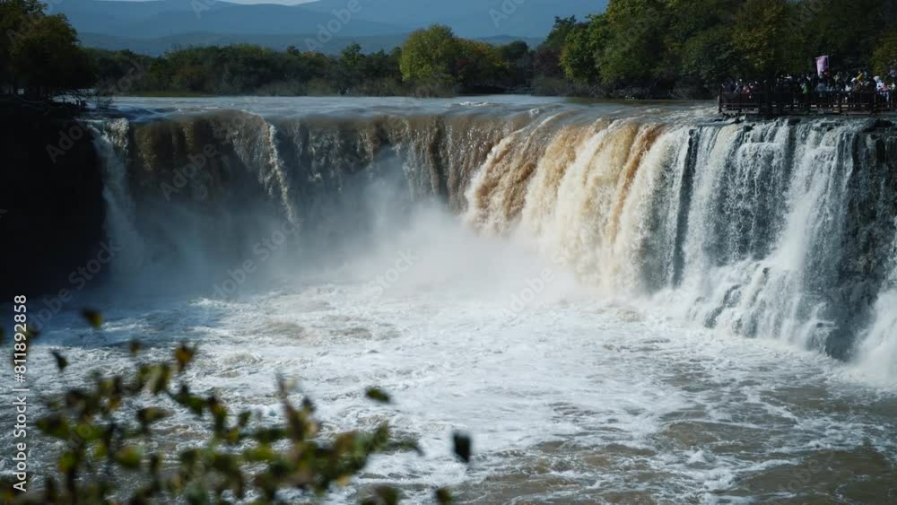 Waterfall in Jingbo Lake Scenic Area, Mudanjiang City, Heilongjiang Province, China Waterfall in Jingbo Lake Scenic Area, Mudanjiang City, Heilongjiang Province, China
